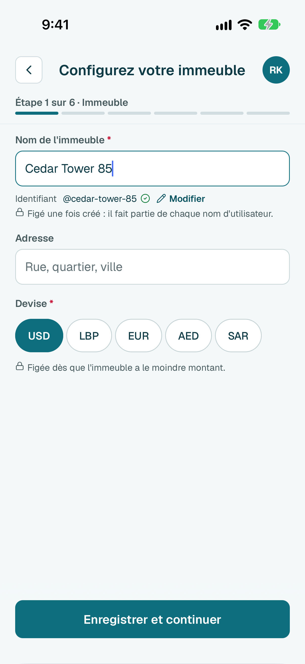 Saisissez le nom de votre immeuble et choisissez sa devise. Puis touchez Enregistrer et continuer.